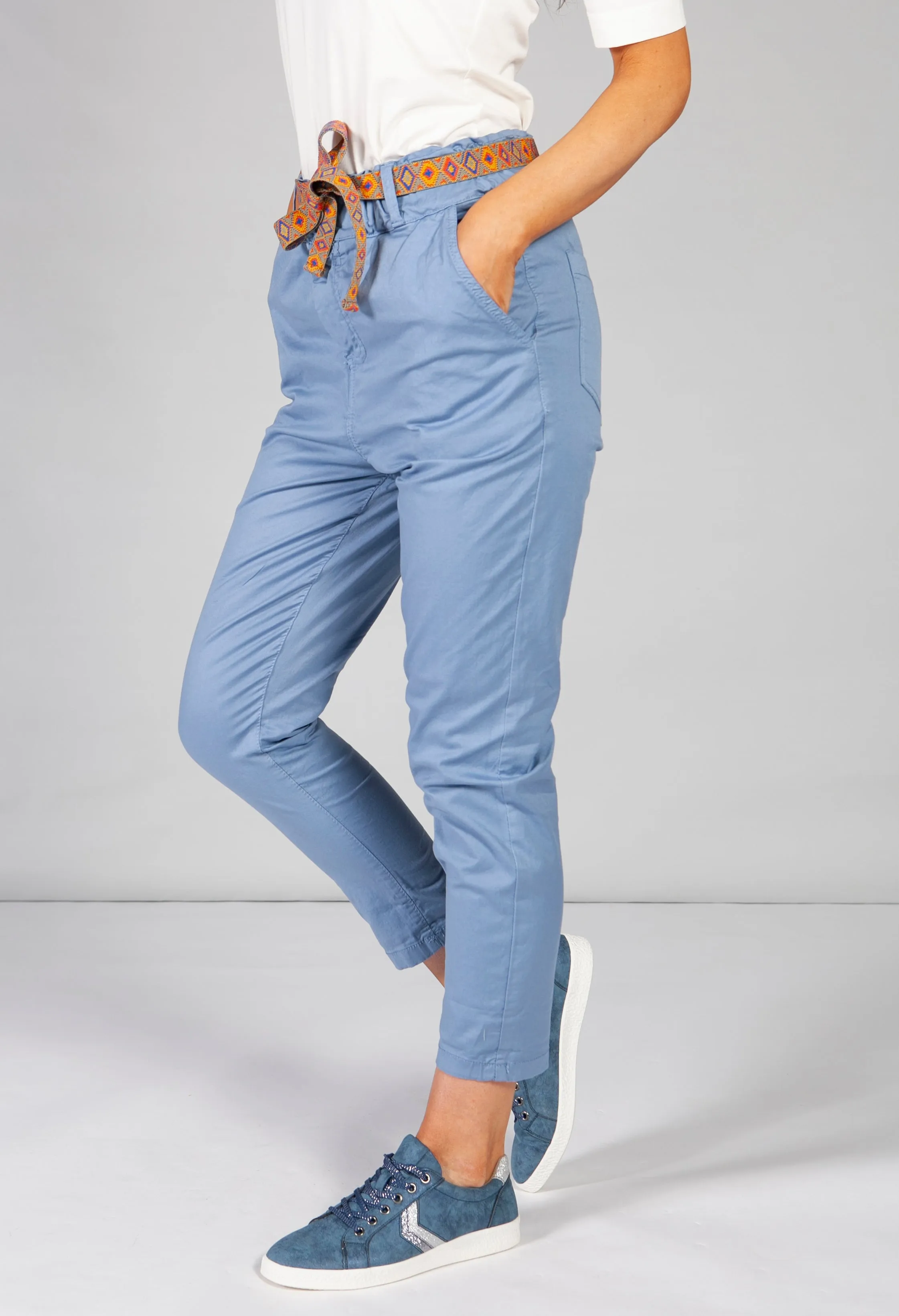 blue chino trousers with aztec print belt