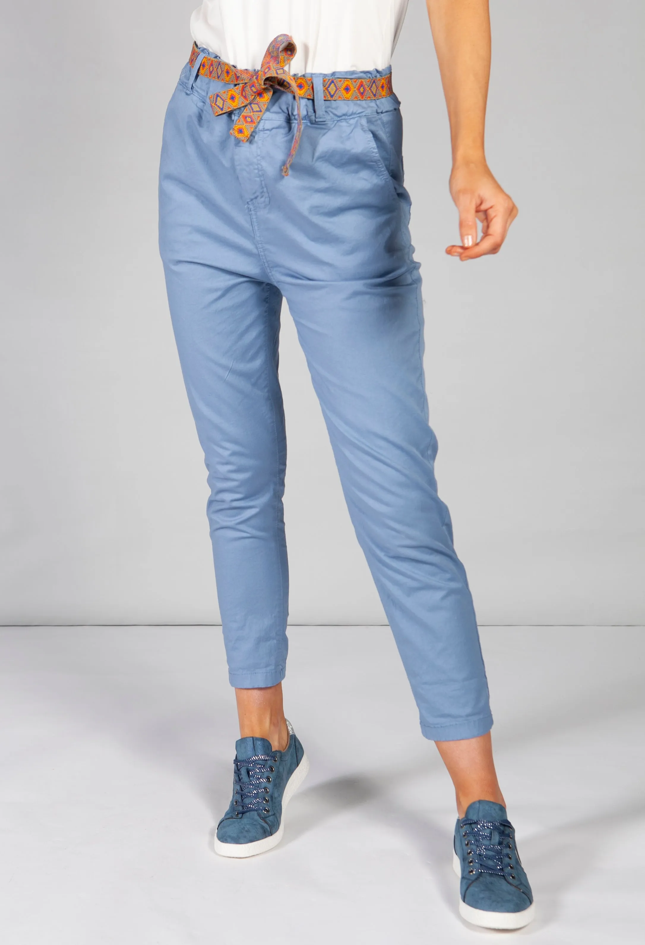 blue chino trousers with aztec print belt